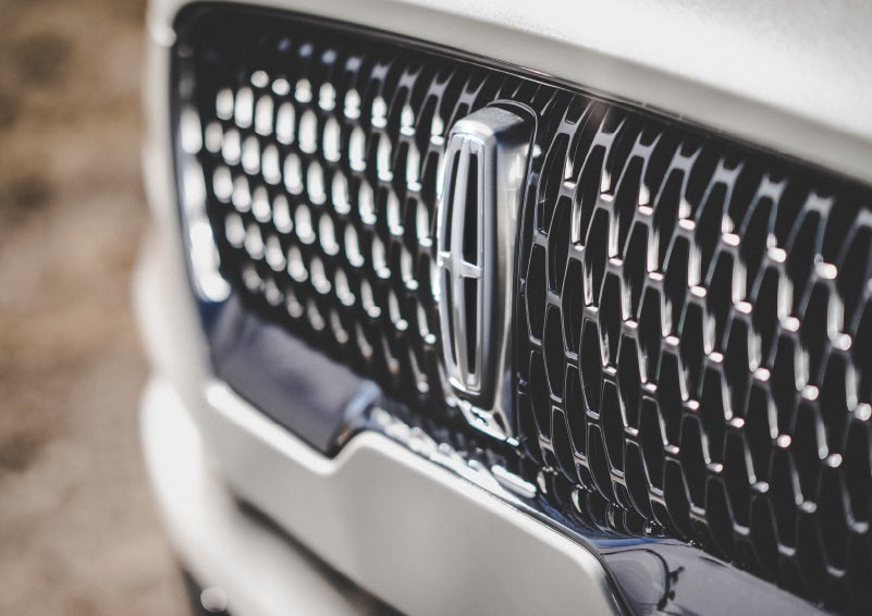 The grille of the 2024 Lincoln Aviator® Reserve model with an eye-catching repeated field of Lincoln Star logo shapes | Performance Lincoln Bountiful in Bountiful UT