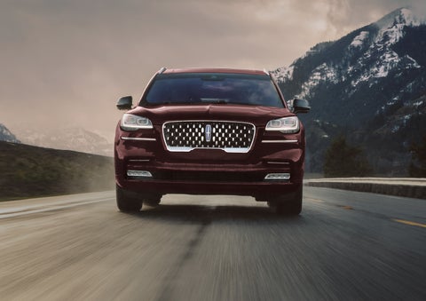 A 2024 Lincoln Aviator® SUV is shown in the Diamond Red exterior color. | Performance Lincoln Bountiful in Bountiful UT