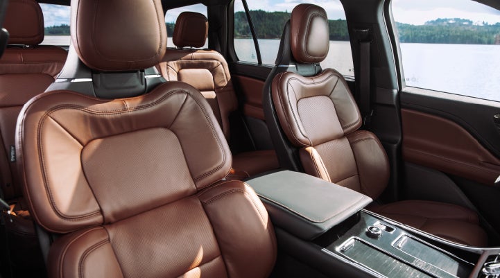 The front row's Perfect Position Seats in a 2024 Lincoln Aviator® Reserve model with Ebony Roast interior | Performance Lincoln Bountiful in Bountiful UT